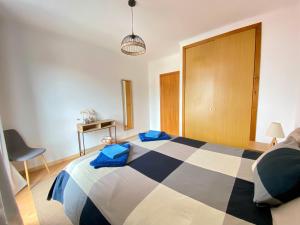 En eller flere senge i et værelse på Azores Physis Apartment - sea view