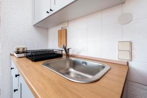 Kuchyň nebo kuchyňský kout v ubytování Guesthouse Ava + 37 fotografií