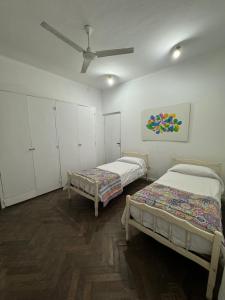 Ένα ή περισσότερα κρεβάτια σε δωμάτιο στο CASA LE FORT- Centro