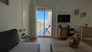 Μια τηλεόραση ή/και κέντρο ψυχαγωγίας στο Apartamento Luna
