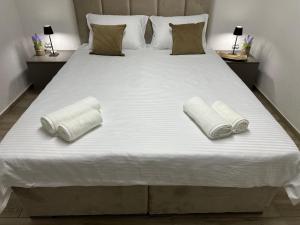Voodi või voodid majutusasutuse Next Rooms toas