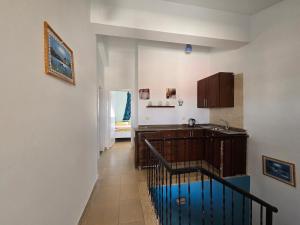 a kitchen with a sink and a counter at Marina Wadi Degla Villa Duplex 4 Bedrooms in Ain Sokhna