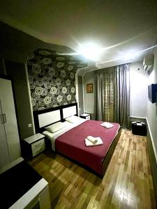 Postel nebo postele na pokoji v ubytování B&B Europa Hotel