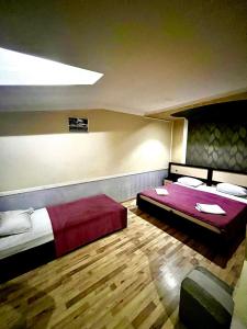 Postel nebo postele na pokoji v ubytování B&B Europa Hotel