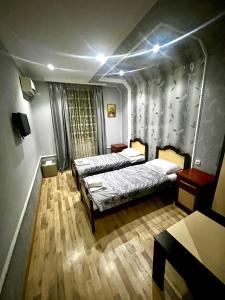 Postel nebo postele na pokoji v ubytování B&B Europa Hotel