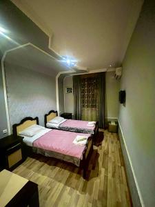 Postel nebo postele na pokoji v ubytování B&B Europa Hotel