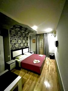 Postel nebo postele na pokoji v ubytování B&B Europa Hotel