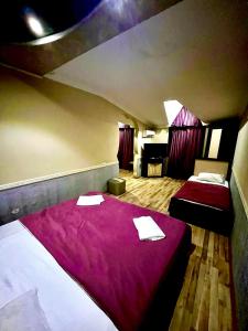 Postel nebo postele na pokoji v ubytování B&B Europa Hotel