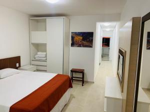 Ένα ή περισσότερα κρεβάτια σε δωμάτιο στο Lagamar Hotel Varginha +21 φωτογραφίες