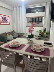Posezení v ubytování Apt 01 Central Com 2 quarto ar cond e 2 tv smart
