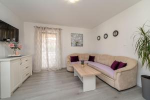 Posezení v ubytování APARTMENT LEO NOVALJA
