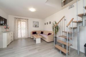 Posezení v ubytování APARTMENT LEO NOVALJA