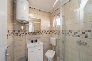 Koupelna v ubytování APARTMENT LEO NOVALJA