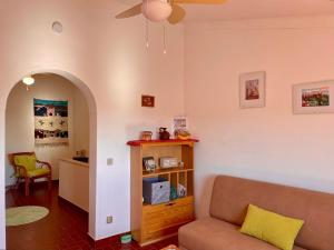 a living room with a couch and a table at Casa David in Castelo de Vide
