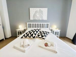 Postel nebo postele na pokoji v ubytování Domus Livi