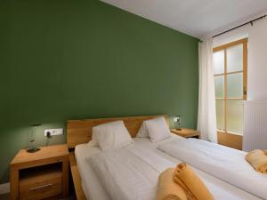 Postel nebo postele na pokoji v ubytování Chalet Sanna Hinterlengau