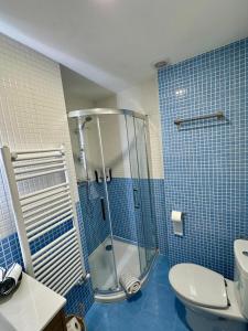 Koupelna v ubytování Alojamiento Barrio Húmedo