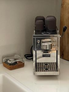 a toaster oven sitting on top of a counter at Comfortable and stylish apartment in quiet area downtown in Reykjavík