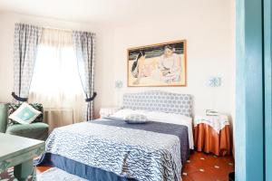 Кровать или кровати в номере Hotel Stefania Boutique Hotel by the Beach