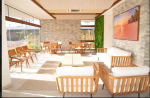 Khu vực ghế ngồi tại Studio Makia aconchegante