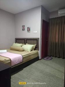Postel nebo postele na pokoji v ubytování HAR Homestay