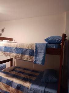 Двухъярусная кровать или двухъярусные кровати в номере El Boquerón - Hospedaje