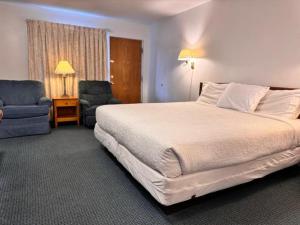 Postel nebo postele na pokoji v ubytování Dreamers Lodge