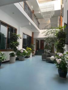 Aed väljaspool majutusasutust Zhangjiajie Borui Hotel - Tianmen Mountain 张家界天门山泊睿庭院酒店