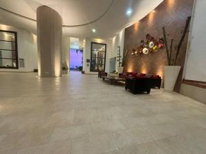 Ο χώρος του λόμπι ή της ρεσεψιόν στο Grand V Beach Front Condo Torre 2000 +49 φωτογραφίες
