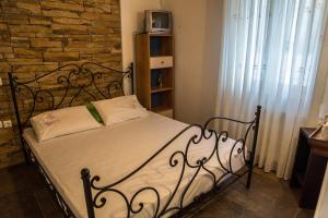 Postel nebo postele na pokoji v ubytování Portolos House: Escape to Ithaca