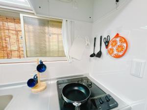 Η κουζίνα ή μικρή κουζίνα στο Ikebukuro area, two layer house, double subway,3 min walk to stn, 双地铁车站步行3分 直达新宿 涩谷 银座 池袋 皇居 最大6人 +43 φωτογραφίες