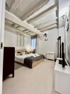 Posteľ alebo postele v izbe v ubytovaní Sweet house near piazza della signoria