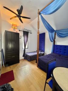 Postel nebo postele na pokoji v ubytování DP Residence SELAYANG