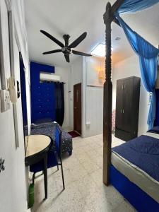 Postel nebo postele na pokoji v ubytování DP Residence SELAYANG