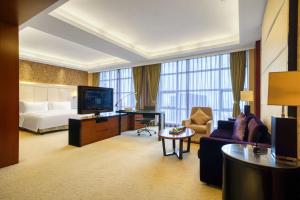 TV a/nebo společenská místnost v ubytování Hangzhou HaiWaiHai Hotel