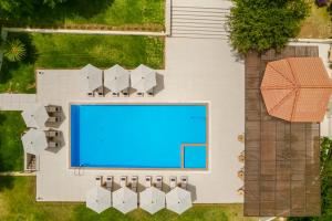an overhead view of a swimming pool in a villa at Rodi Studios in Karavádhos