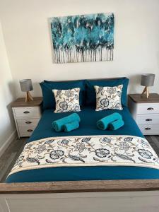 Ένα ή περισσότερα κρεβάτια σε δωμάτιο στο 39 Wells Street Apartment