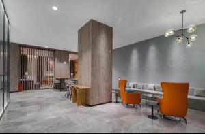Posezení v ubytování Country Inn & Suite by Radisson, Shanghai Railway Station