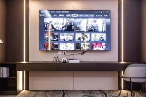 TV a/nebo společenská místnost v ubytování 中山明景 + 14 fotografií