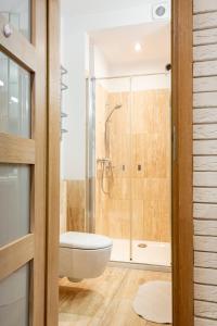 Łazienka w obiekcie Apartament Nosalowy Sen Jacuzzi & Sauna