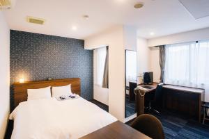 Ένα ή περισσότερα κρεβάτια σε δωμάτιο στο HOTEL　KAMO +5 φωτογραφίες