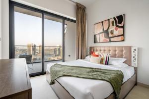 Postel nebo postele na pokoji v ubytování GuestReady - Marvellous getaway in Business Bay