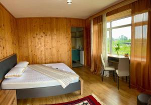 Postel nebo postele na pokoji v ubytování Guest House Leon