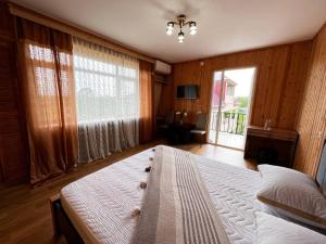 Postel nebo postele na pokoji v ubytování Guest House Leon