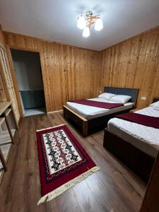 Postel nebo postele na pokoji v ubytování Guest House Leon