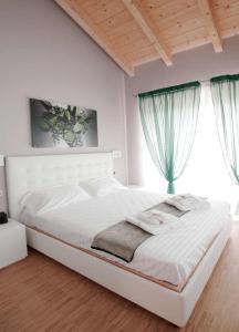 Una cama o camas en una habitación de Tenuta Valdorso - Agri Resort