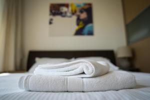 Postel nebo postele na pokoji v ubytování Apartment Adagio