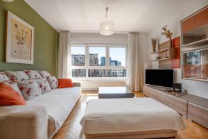 TV a/nebo společenská místnost v ubytování Apartment Adagio