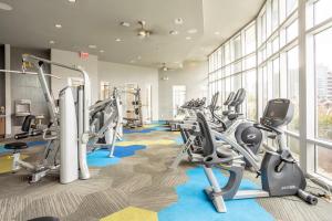 a gym with treadmills and elliptical machines at Downtown 1br w gym wd pool nr Capitol ATX-75 in Austin