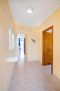 A bed or beds in a room at Apartamentos Strelitzias